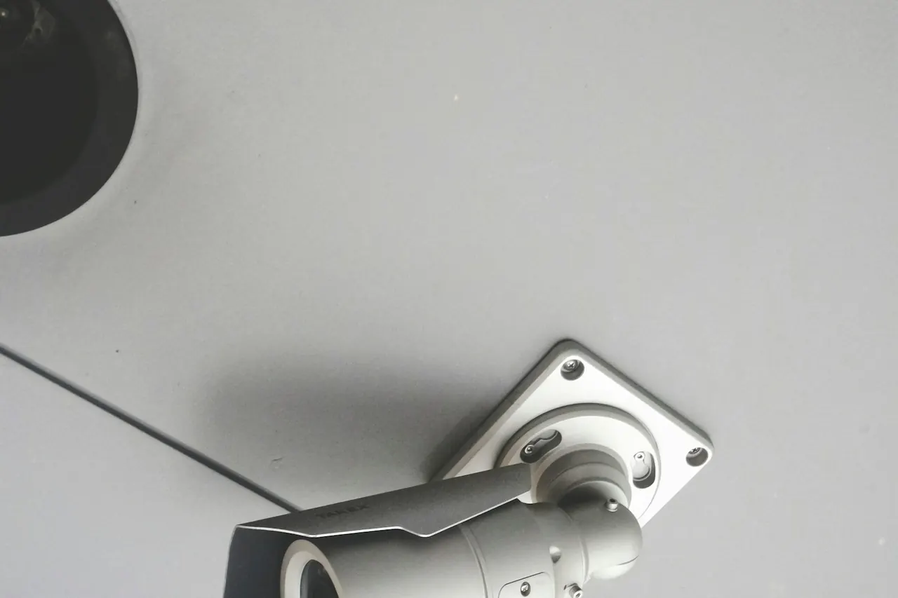 Bullet CCTV camera on a ceiling mount