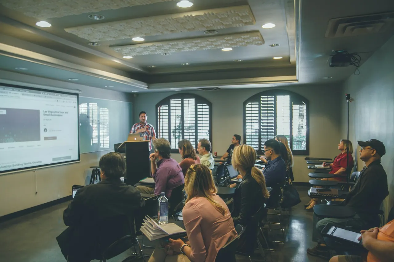 Training room with a presentation on a projector screen